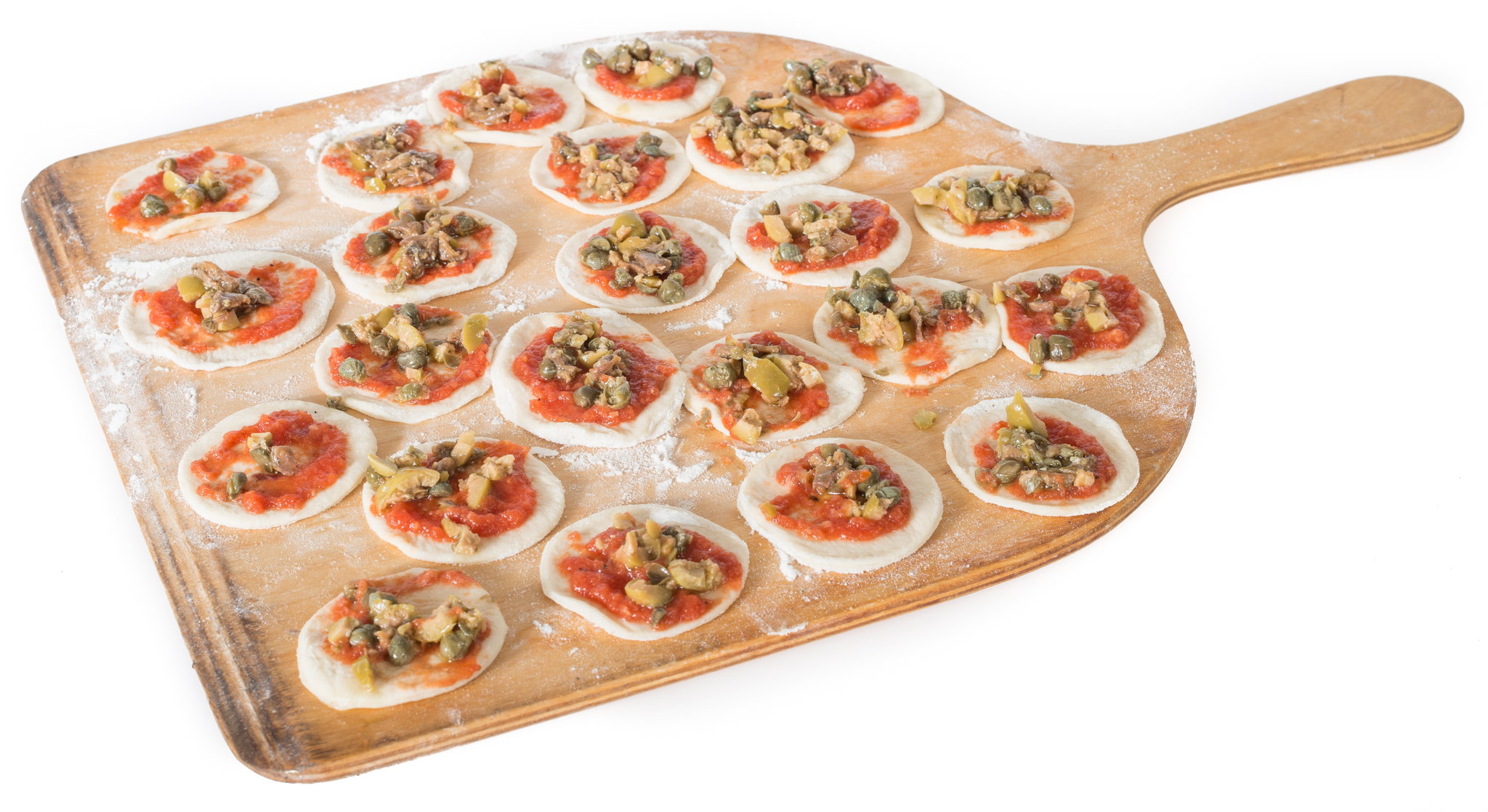 Pizza, mini - bagespade med udbagte minipizzaer med tomat, oliven, sardel og kapers